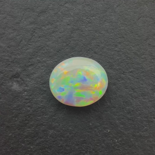 0.54ct CrystaL Opal With Red, Pink Multicolor Play Of Color, From Lightning Ridge Australia