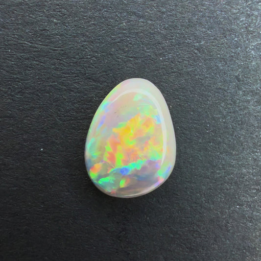 0.67cts Affordable Dark Crystal Opal With A Green, Yellow, Gold Multicolor Play Of Color, From Lightning Ridge Australia