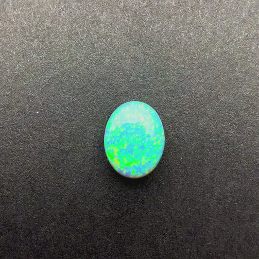 0.9cts Affordable Dark Opal With A Green Yellow Gold Play Of Color, From Lightning Ridge Australia