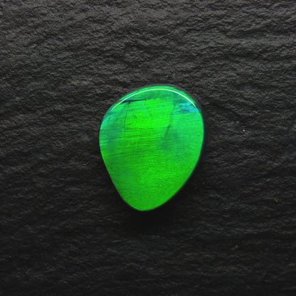 1.28 World Class Black Opal With A Blindingly Bright Metallic Green Rolling Broadflash Pattern