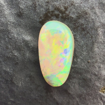 0.9cts Affordable Crystal Opal With A Green Yellow Gold Play Of Color, From Lightning Ridge Australia