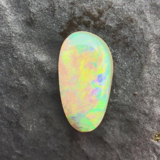 0.9cts Affordable Crystal Opal With A Green Yellow Gold Play Of Color, From Lightning Ridge Australia