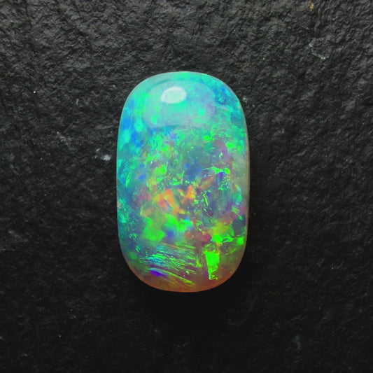 0.89ct Crystal Opal, This Cushion Cut Gem Has Green-Gold Color Palette With Mixed Patterns And Lots Of Depth