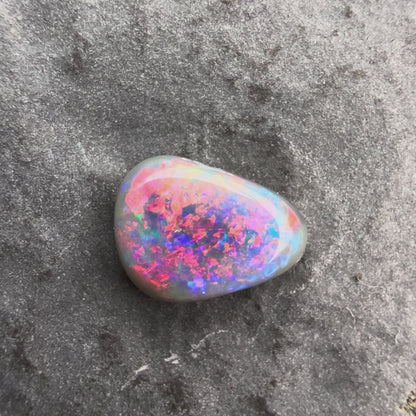 0.49cts Affordable Black Opal With A Vivid Red Pink Multicolor Play Of Color, From Lightning Ridge Australia