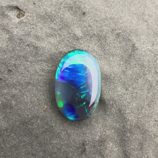 0.74cts Affordable Black Opal With A Blue Green Play Of Color, From Lightning Ridge Australia