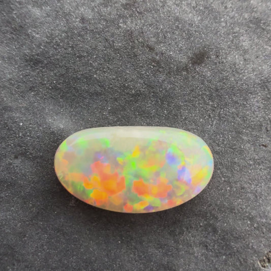 0.6cts Affordable Dark Opal With A Red Multicolor Play Of Color, From Lightning Ridge Australia