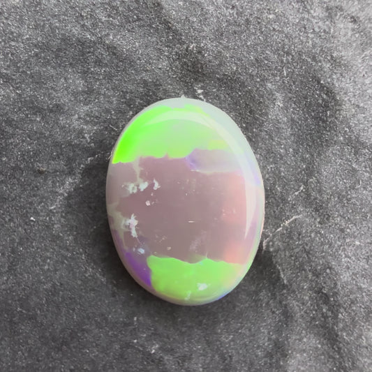 0.77cts Affordable Dark Opal With A Vivid Green Yellow Gold Play Of Color, From Lightning Ridge Australia