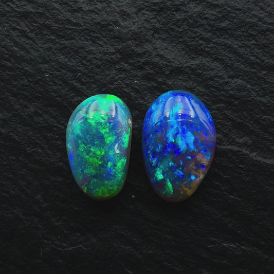 2.33ct Mismatched Pair (Price For Parcel) Black Opals With Blues And Greens And A Freeform Shape