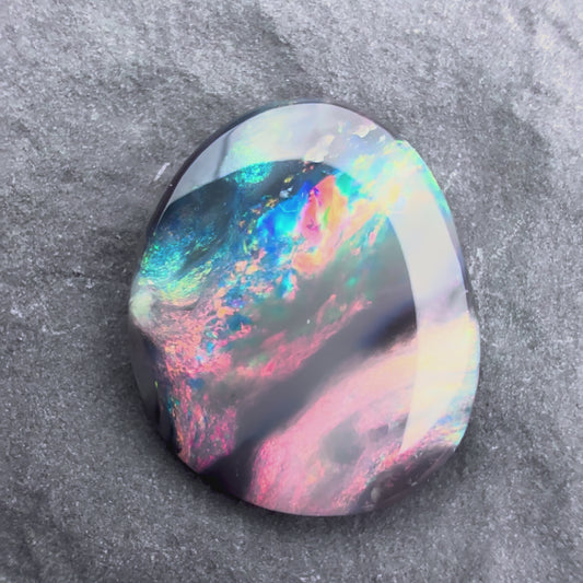 1.12cts Picture stone Black Opal With A Red Pink Multicolor Palette