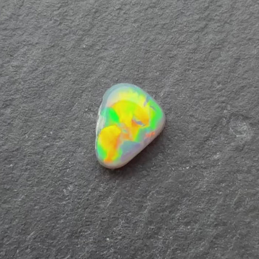 0.39ct Dark Opal With A Green, Yellow, Gold Play Of Color, From Lightning Ridge Australia