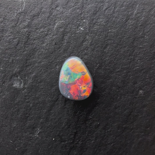 0.35ct Black Opal With A Red, Pink Multicolor Play Of Color, From Lightning Ridge Australia