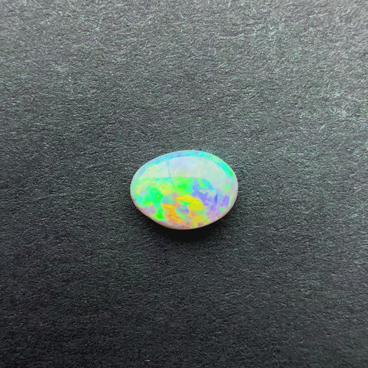 0.38cts Affordable Dark Opal With A Green, Yellow, Gold Multicolor Play Of Color, From Lightning Ridge Australia