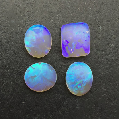 2.34ct Bundle (Price For Parcel) Matte finished opals with a soft purple-green glow
