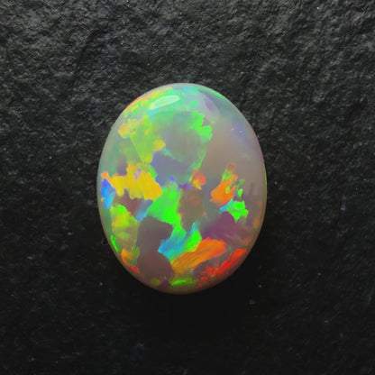 0.7ct Dark Opal, This Stone Has A Lovely Blocky Floral Pattern And A Pastel, Multi-color Palette