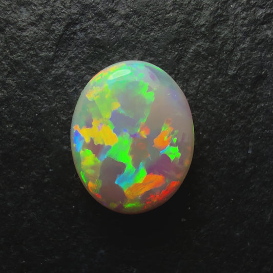 0.7ct Dark Opal, This Stone Has A Lovely Blocky Floral Pattern And A Pastel, Multi-color Palette