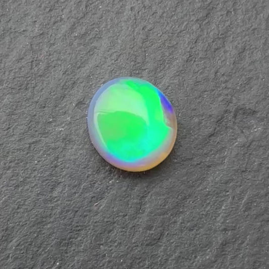 0.49ct Crystal Opal With A Green, Blue Play Of Color, From Lightning Ridge Australia