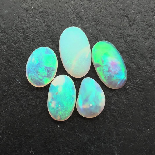 1.1ctct Bundle (Price For Parcel) Matte finished opals with a soft green glow