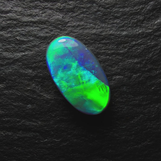 1.61ct Black Opal, This Gem Has A Vivid Green-Blue Color Palette And Broadflash Pattern