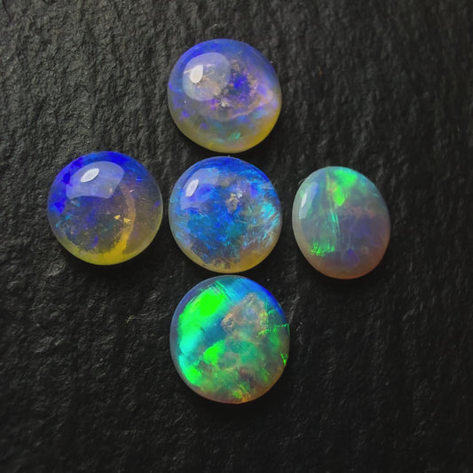 (Price For Parcel) 26 Small Crystal opals rounds, With Blues Green And Purple