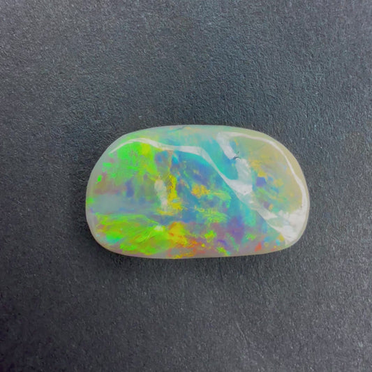 2.77cts Dark Opal Carving With A Red Pink Multicolor Play Of Color, From Lightning Ridge Australia