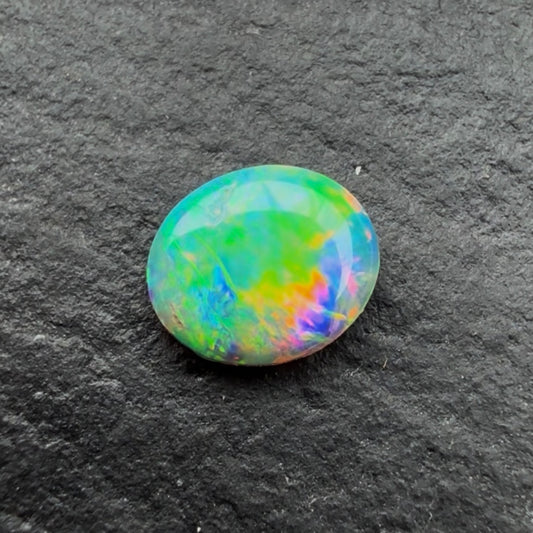 0.33cts Crystal Opal With A Red Pink Multicolor Play Of Color, From Lightning Ridge Australia