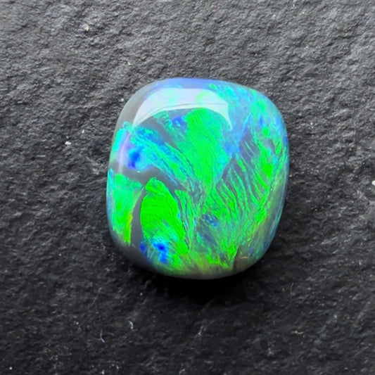 0.78cts Black Opal With A Green Blue Play Of Color, From Lightning Ridge Australia