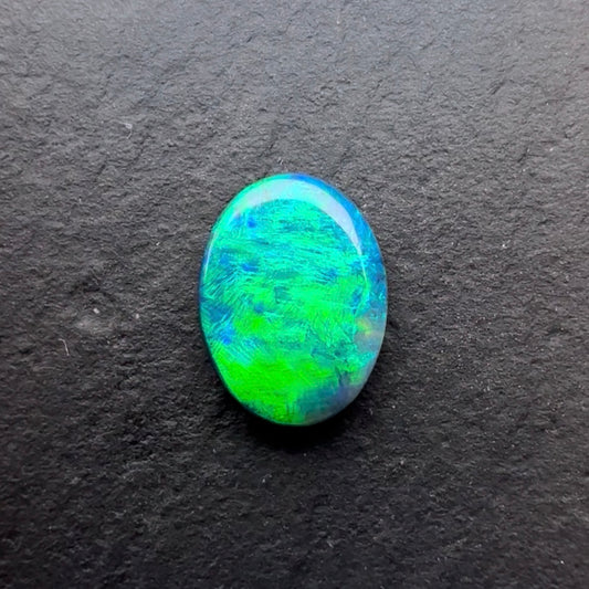 0.71cts Black Opal With A Green, Blue Play Of Color, From Lightning Ridge Australia
