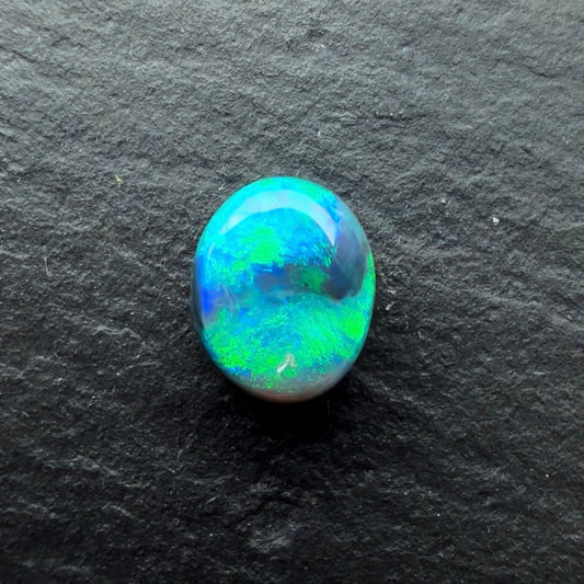 0.99cts Black Opal With A Green, Blue Play Of Color, From Lightning Ridge Australia