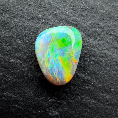 0.60cts Black Opal With A Red Pink Multicolor Play Of Color, From Lightning Ridge Australia