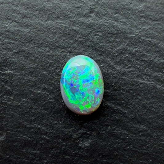 0.64cts Crystal Opal With A Green, Blue Play Of Color, From Lightning Ridge Australia