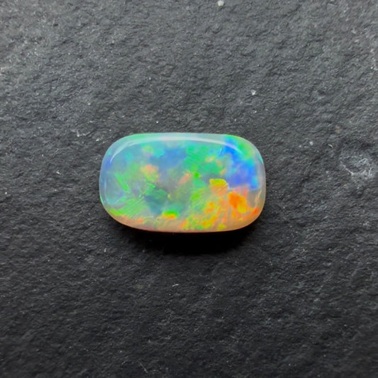 0.44cts Crystal Opal With A Red Pink Multicolor Play Of Color, From Lightning Ridge Australia