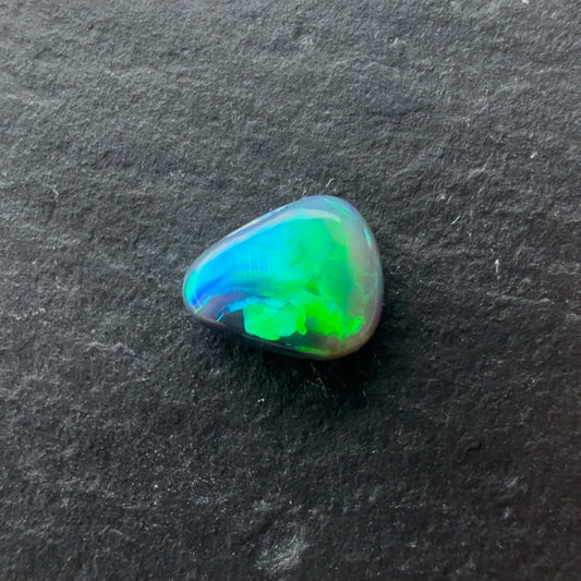 0.50cts Black Opal With A Green, Blue Play Of Color, From Lightning Ridge Australia