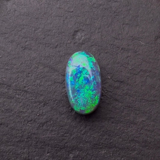 0.95cts Black Opal With A Green, Blue Play Of Color, From Lightning Ridge Australia