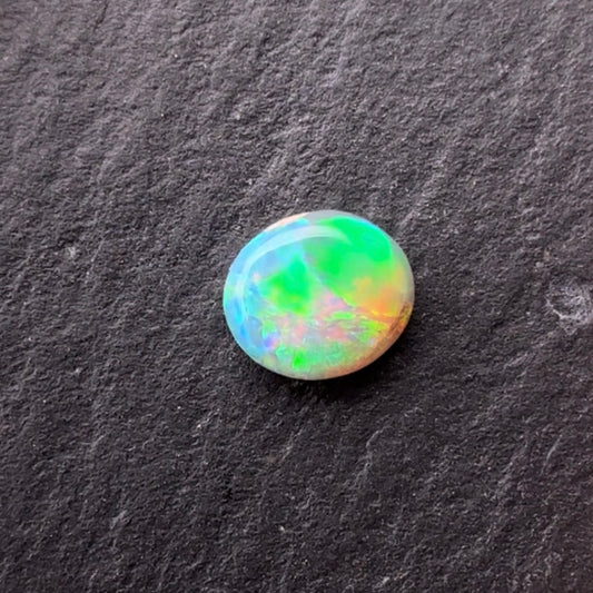 0.49ct Crystal Opal With A Green, Yellow, Gold Play Of Color, From Lightning Ridge Australia