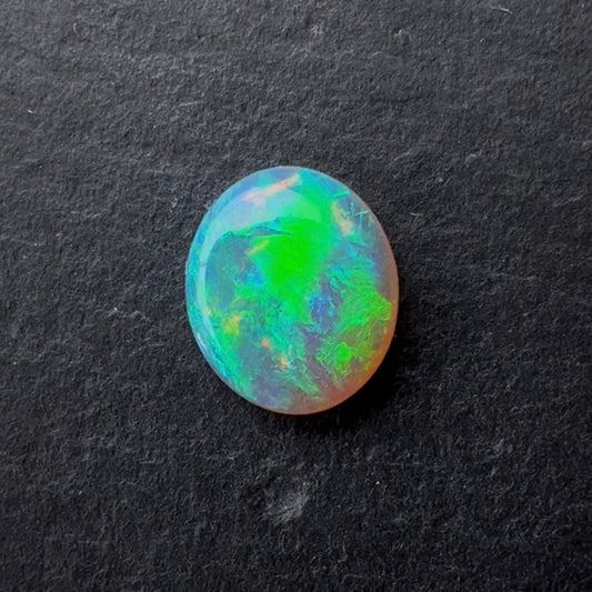 0.90ct Crystal Opal With A Green, Blue Play Of Color, From Lightning Ridge Australia