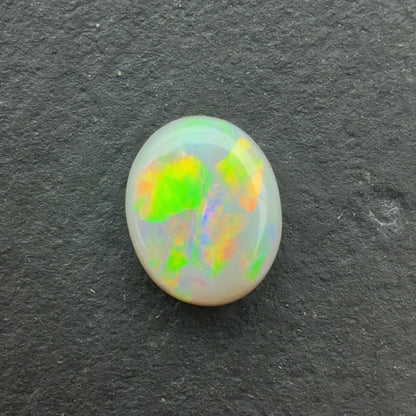 O.86ct Opal With Green, Yellow, Gold Play Of Color, From Lightning Ridge Australia