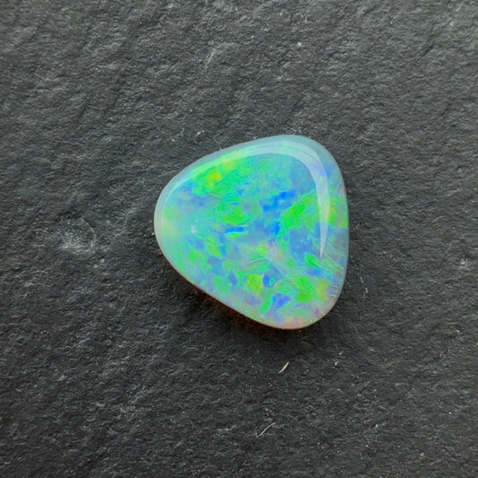 0.78ct Semi-Black Opal With A Green, Blue Play Of Color, From Lightning Ridge Australia