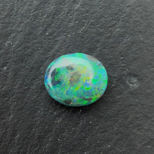 0.74ct Semi-Black Opal With A Green, Blue Play Of Color, From Lightning Ridge Australia