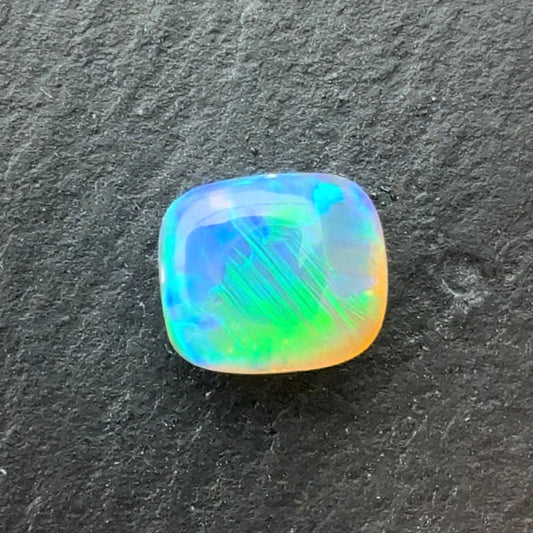 1.47ct Crystal Opal With A Green, Blue Play Of Color, From Lightning Ridge Australia