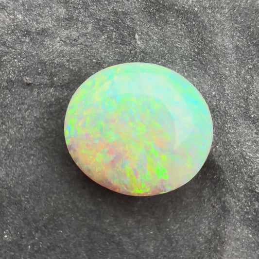 0.8cts Affordable Crystal Opal With A Blue Green Yellow Gold Play Of Color, From Lightning Ridge Australia