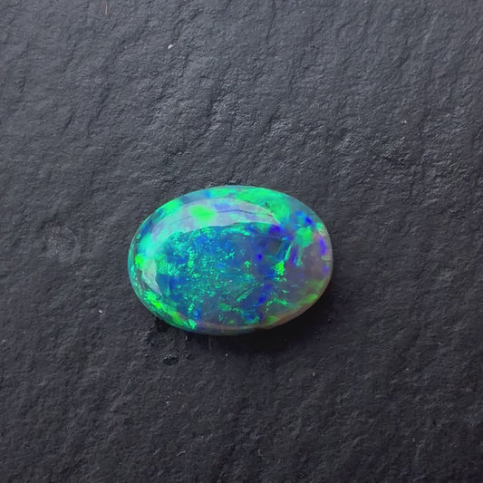 0.91ct Crystal Opal With A Green, Blue Play Of Color, From Lightning Ridge Australia