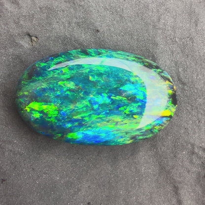 4.72cts Gem Black Opal With A Beautiful Green Yellow Gold Play Of Color, From Lightning Ridge Australia