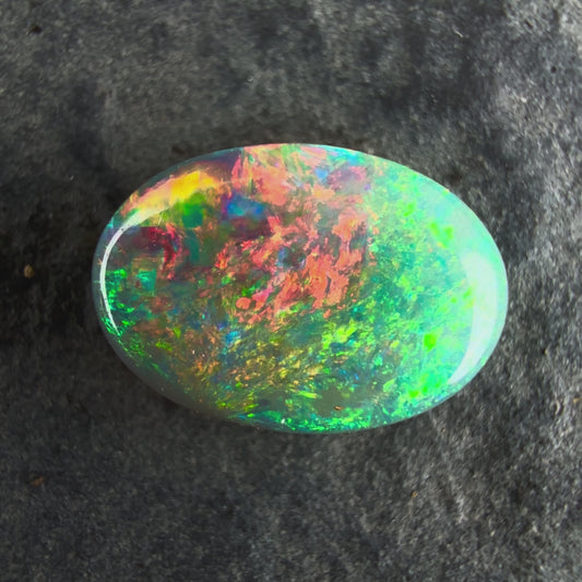 0.79cts Affordable Gem Dark Opal With A Beautiful Mixed Red Pink Multicolor Pattern