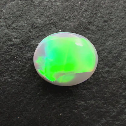 1.0ct Affordable Dark Opal With Neon Green Broadflash Pattern