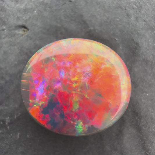 3.5ct Black Opal With A Rare Pink-Orange Broadflash Pattern, Shifting to Green As The Stone Is Moved (Copy)