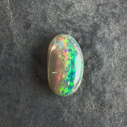 0.84cts Affordable Dark Opal With A Beautiful Mixed Green Yellow Gold Pattern