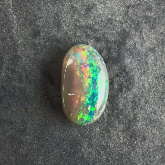0.84cts Affordable Dark Opal With A Beautiful Mixed Green Yellow Gold Pattern