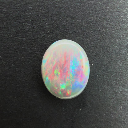 0.64cts Affordable Dark Opal With A Red Pink Multicolor Play Of Color, From Lightning Ridge Australia