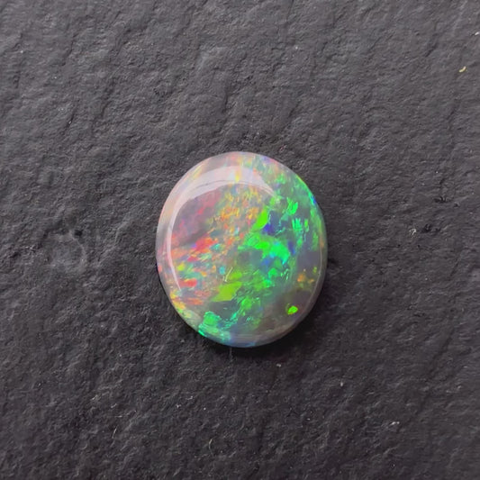 0.59ct Black Opal With A Red, Pink Multicolor Play Of Color, From Lightning Ridge Australia