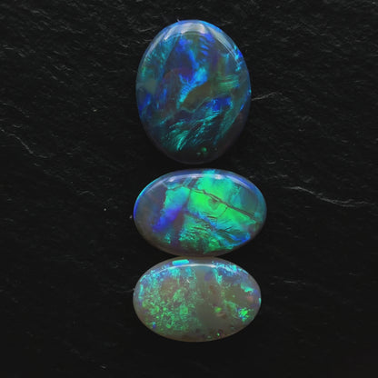 4.5ct Bundle (Price For Parcel) Larger Dark Opals With Minty Greens And Blues